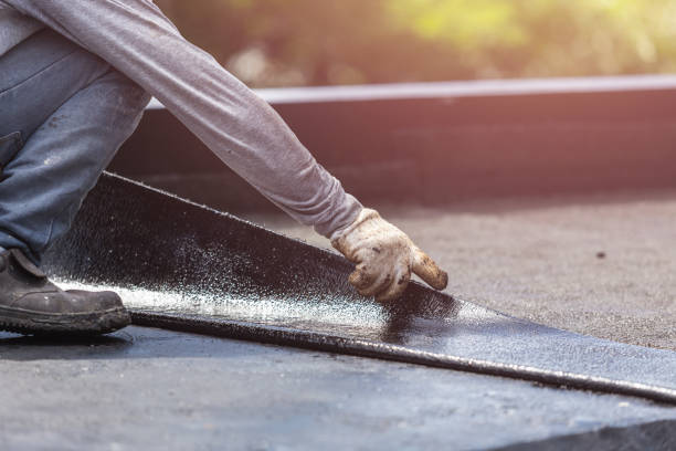 Professional Basement Waterproofing technician working in Helmetta, NJ